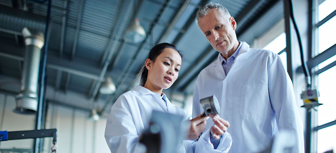 Two people in lab coats